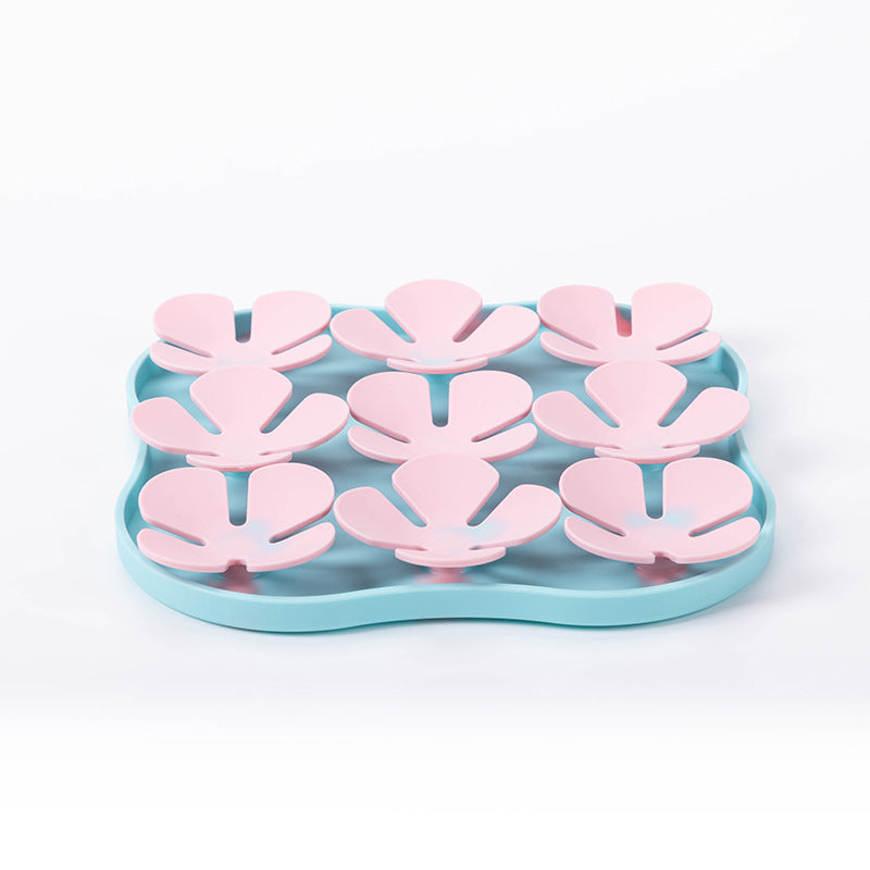 Calming lick pad for dogs during grooming sessions.