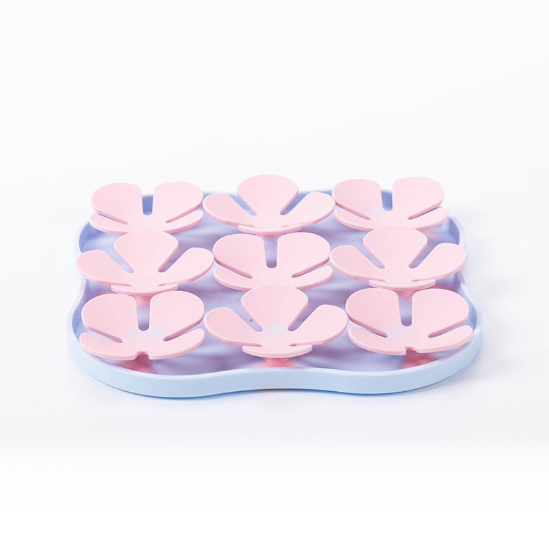 Dog using a Silicone Snuffle Mat for dry kibble.